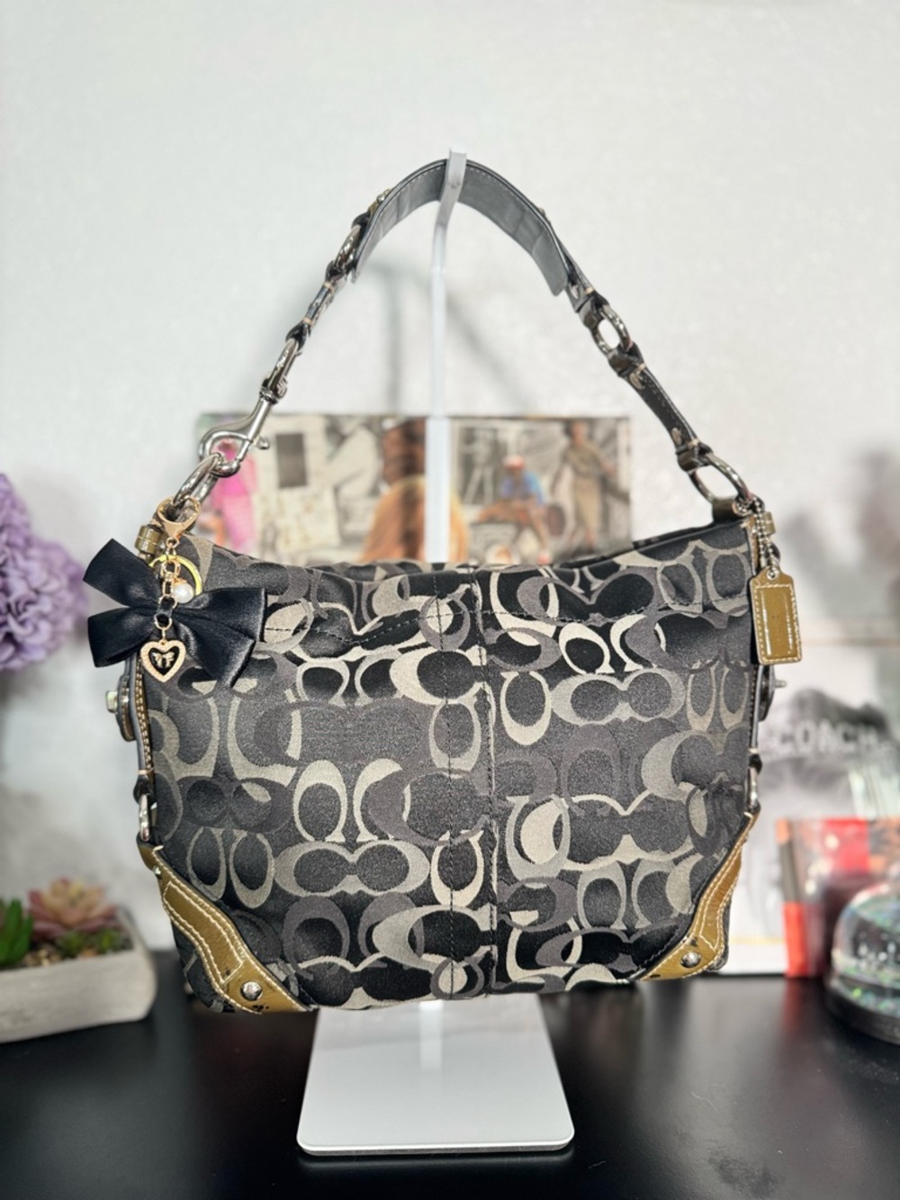 Coach Carly inBlack Signature Jacquard Shoulder Bag with Gold Trim and Bow Charm